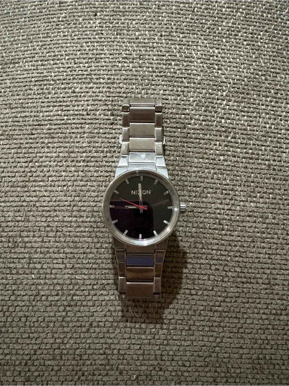Nixon Men’s Silver Bracelet Watch with Black Dial and Red Second Hand
